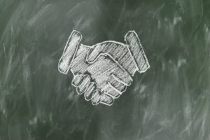 shaking hands stakeholder requirements project management